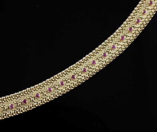 An Italian 18ct gold and ruby set bracelet, 18.5cm.